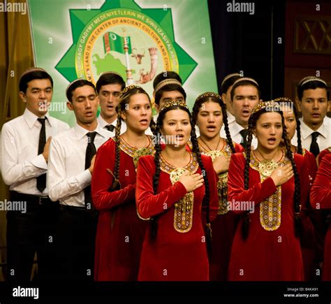 singing of national anthem by choir in native costume at opening of ...