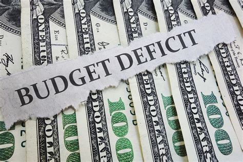 Budget Deficit - Overview, Components, Implications, and Theories