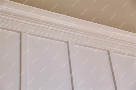 Premium Photo | Elegant Crown Molding and White Wall Paneling Classic ...