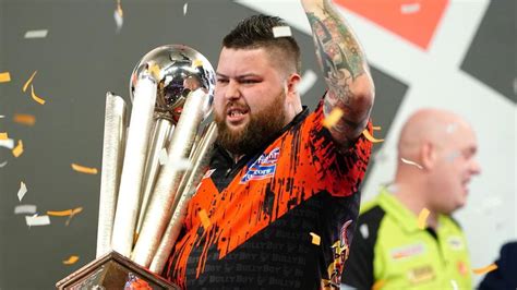 World Darts Championship: Michael Smith defeats Michael van Gerwen to ...