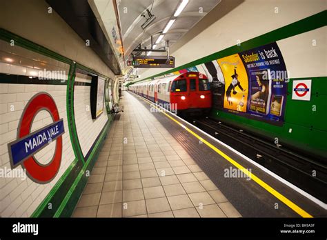 Train at a subway station, London Underground, London, England Stock Photo - Alamy