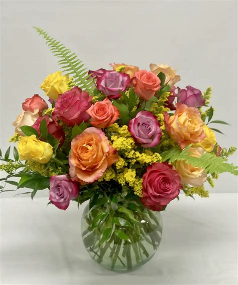 Two dozen premium Ecuadorian roses in assorted complimentary colors. These are a customer ...