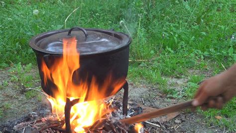 Rustic Pot Boiling Outdoor On A Fire In Yard, Rural Cooking, Healthy ...