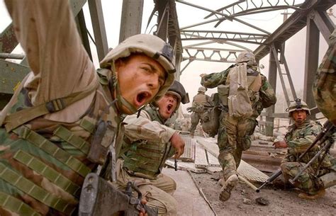 US Marines are crossing a bridge in Baghdad, Iraq, April 7, 2003. | Marine, Us army rangers ...