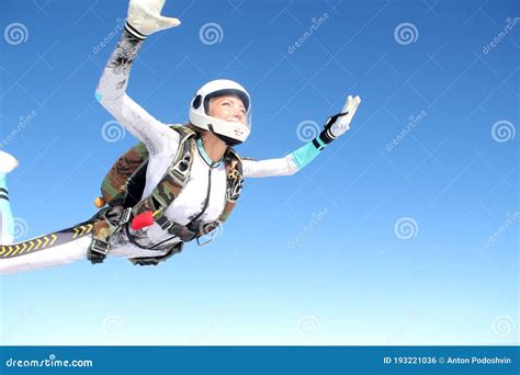 Skydiving. Solo Jump. a Girl is in the Sky. Stock Photo - Image of skydive, parachuting: 193221036