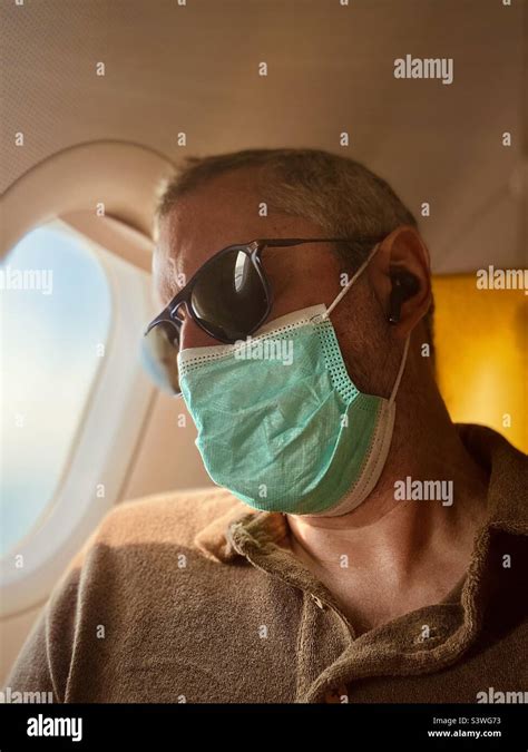 Flying during Covid outbreak Stock Photo - Alamy