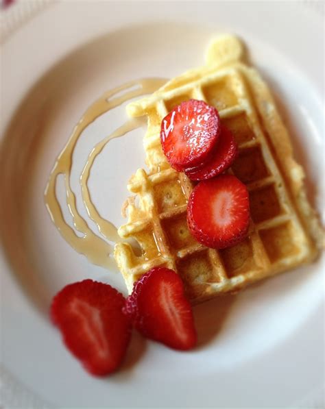 Waffle with strawberries and maple syrup | Food, Foodie, Waffles