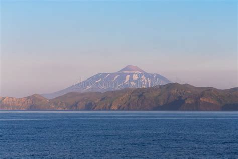 View on a Kunashir Island with Volcano Tyatya from the Sea. Stock Photo - Image of pacific ...