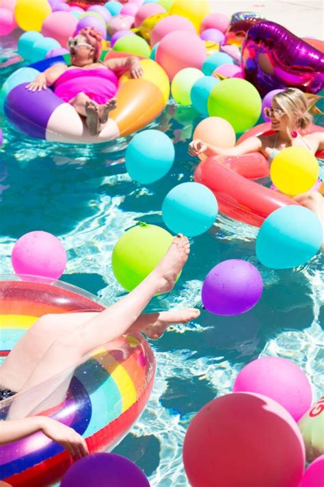 An Epic Rainbow Balloon Pool Party | Pool party kids, Pool birthday party, Pool party themes