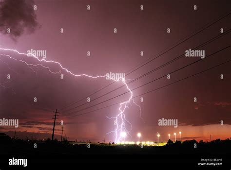 Lightning strikes during a monsoon storm near a sports field in Tucson, Arizona, USA Stock Photo ...