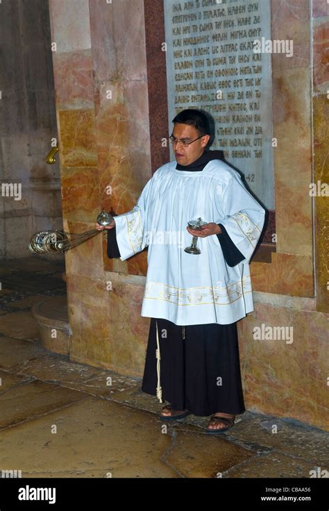 Thurible held by altar server in the church of the holy sepulcher in Jerusalem Israel Stock ...