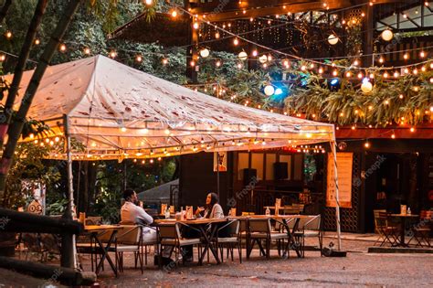 Premium Photo | Beautiful street restaurant in the night in el poblado ...