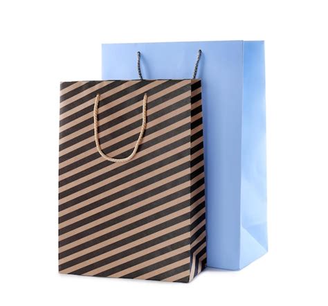 Premium Photo | Colorful paper shopping bags isolated on white