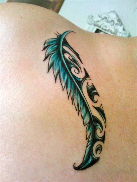 My first tattoo, a feather with the Maori koru design. The koru ...