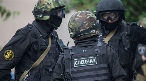 Armed FSB Officers Search Office of Russian Rights Group - The Moscow Times