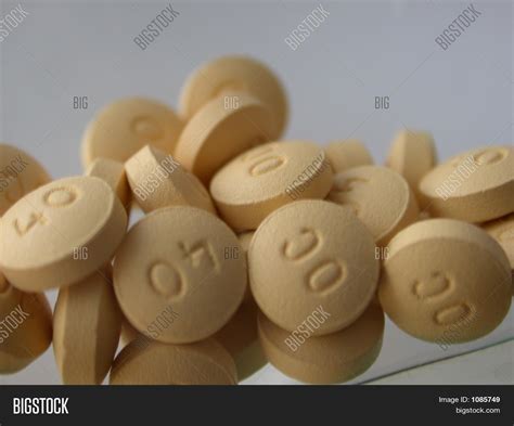 Yellow Pain Pills Image & Photo | Bigstock