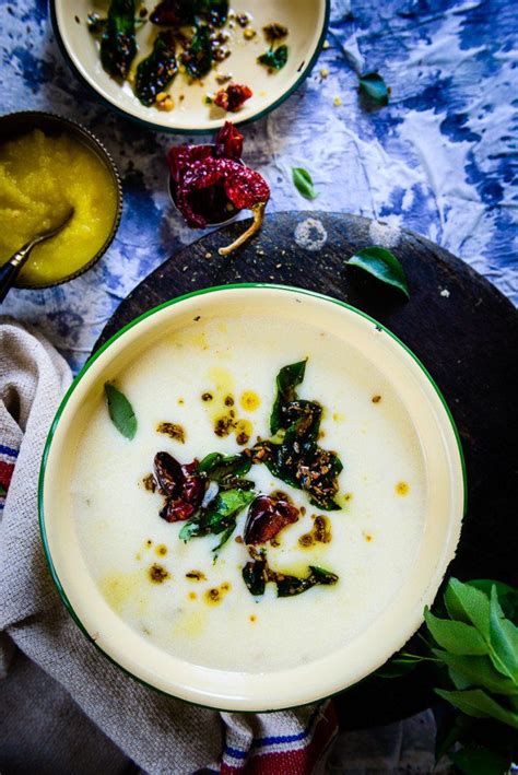 Gujarati Kadhi is a simple gravy made using chickpea flour and sour yogurt> it goes with with ...