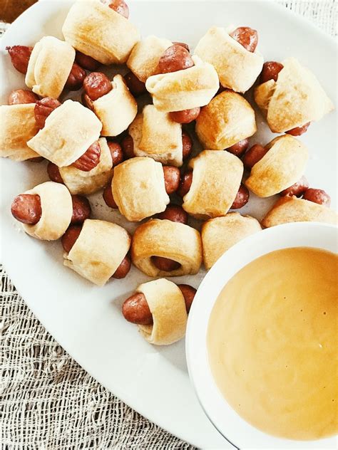 Mini Crescent Hot Dogs with Cheddar Cheese Dip