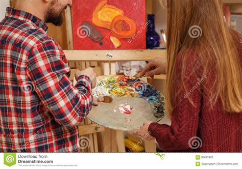 Artist with palette knife stock photo. Image of hobby - 90697462