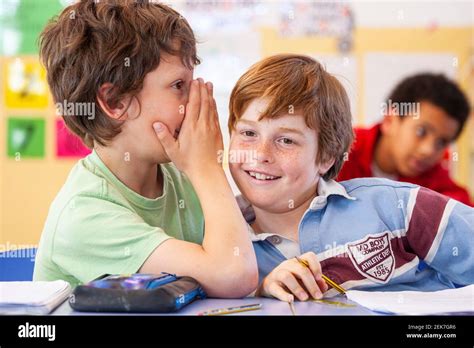 Children misbehaving in classroom hi-res stock photography and images - Alamy