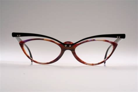 Unusual top line cat eye eyeglasses by TRACTION PRODUCTIONS Mod. TCHANG ...