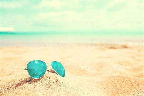 Sunglasses on the beach 2922935 Stock Photo at Vecteezy