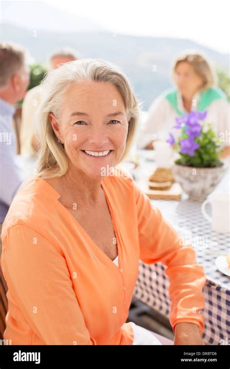 50 woman smiling hi-res stock photography and images - Alamy