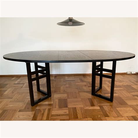 Elegant Expandable Black Wood Dining Table - AptDeco