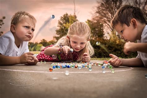 A new perspective on a child's game of marbles. I love the expressions ...