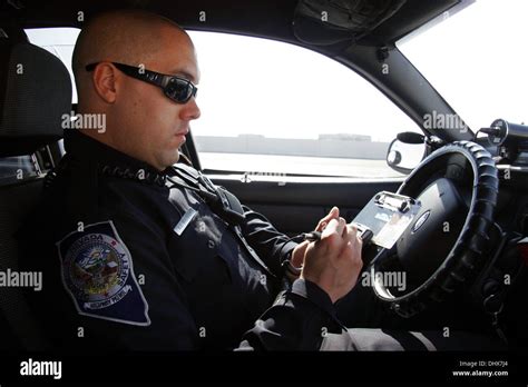 Nevada State Police, State Trooper Highway Patrol officer checks a ...