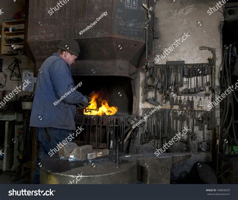 Blacksmith Works In A Small Smithy Stock Photo 168858029 : Shutterstock