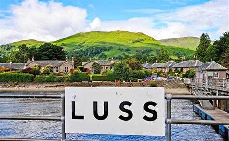 Luss Village on banks of Loch Lomond in Trossachs | Loch lomond, Glasgow, Luss