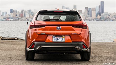 2019 Lexus UX 200h Hybrid F Sport (Color: Cadmium Orange) - Rear | Caricos