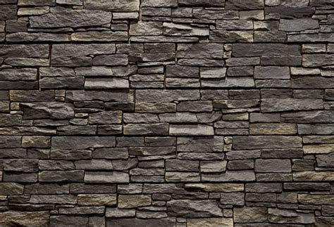 a stone wall that is made out of different types of rocks