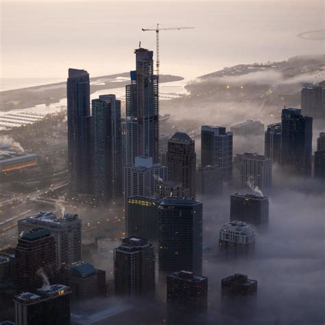 Aerial view of a foggy cityscape 1407908 Stock Photo at Vecteezy