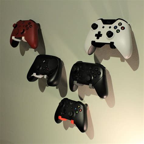 Free STL file Wall Mount Controller Holder 🎮 ・3D printing model to download・Cults