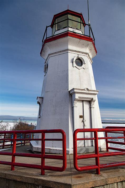 Cheboygan Lighthouse in Cheboygan Michigan in the winter Photograph by ...