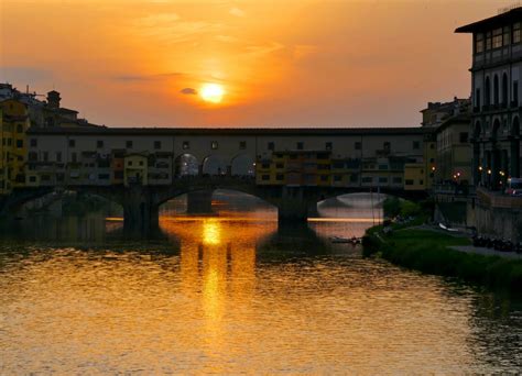 Sunset over Ponte Vecchio in Florence - BoomerVoice