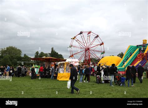 Crowds Walking Around Rides At Cheam Village Fair Surrey England Stock ...