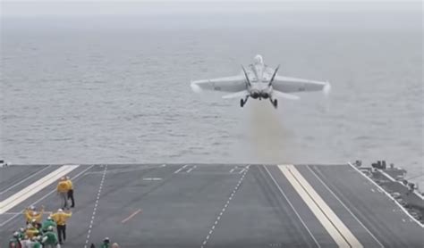 Watch the Navy's newest, most sophisticated aircraft carrier land and ...