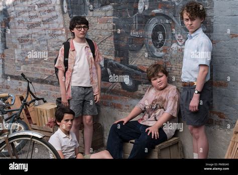 (L-r) JACK DYLAN GRAZER as Eddie Kaspbrak, FINN WOLFHARD as Richie Tozier, JEREMY RAY TAYLOR as ...