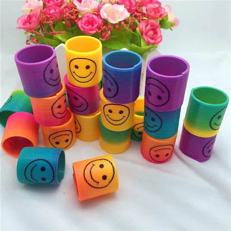 24 PCS/Lot Rainbow Spring Magic Plastic Slinky Rainbow Spring Colorful ...