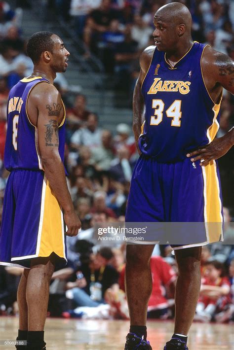 Shaquille O'Neal and Kobe Bryant of the Los Angeles Lakers talk on ...