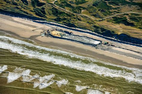 Aerial photograph Langeoog - Sandy beach rinsing Coastal protection ...