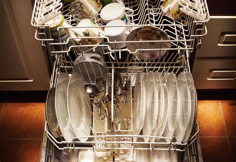 Clean Dishes in Dishwasher stock photo. Image of cuisine - 105245674