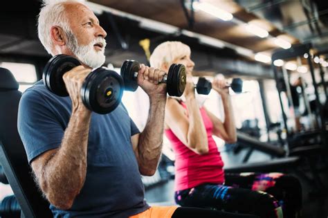 Fit senior sporty couple working out together at gym | For Seniors Magazine