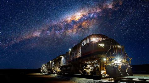 Train under the Milky Way - backiee