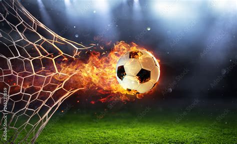 Fiery Soccer Ball In Goal With Net In Flames Stock Photo | Adobe Stock