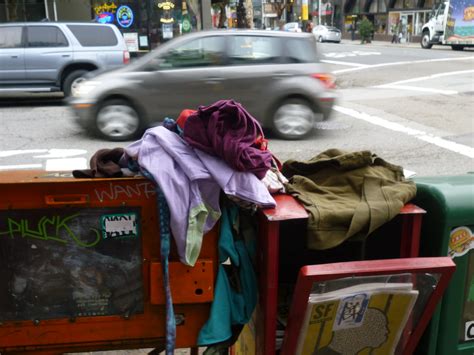 Discarded clothes | A pile of discarded clothes with a car p… | Flickr