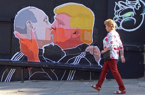 Lithuanian Street Artist Creates Colorful Mural Depicting Putin-Trump Kiss